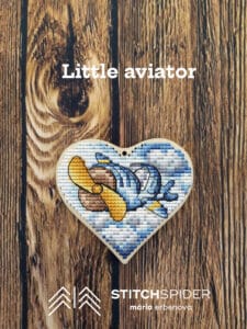 Little aviator on wood