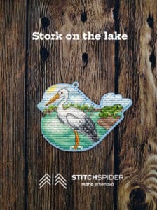 Stork on the lake on wood